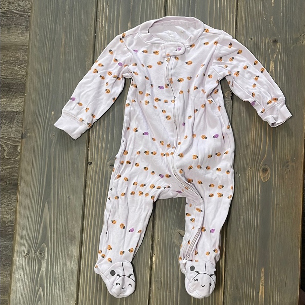 Carter’s light purple and orange ladybug zipper onesie. Size 6 Month.